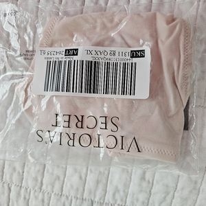 Victoria's Secret string thong panties.  Pale pink.